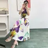 Vestidos de trabajo Miyake Pliegues Elegante Camiseta delgada con estampado floral Cintura alta Falda midi plisada de una línea Falda midi de dos piezas Traje de moda de nicho