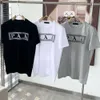 Mode t designer t shirt mens kvinnor plus size brev tryck grafisk tee casual lös fast färg kort ärm topp rund nacke pullover bomull överdimensionerad tee