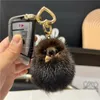 Plush Ball Real Fox Fur Keychain Söt Fashion Pendant Women Handväskor Ornament Bil Nyckel Trinor Metal Rings Highend Gift 240103