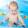 Magnetfiske Wind-Up Swimming Whales Bathtub Toy Baby Bath Toys Fishing Game Water Tub Toys Set With Fishing Pole Net för barn 240104