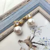 Four sided diamond Swallow pearl earrings light luxury and versatile earrings