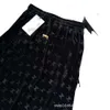 24初秋に新しい女性用ドレスレターエンボスデザインベルベットファブリックファッショナブルで多用途のハーフスカート