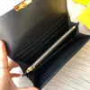 10AA Carteira preta de luxo de alta qualidade estilo longo Carteira de couro da moda com vários bolsos Duas bolsas de órgão, uma bolsa com zíper, duas bocas planas e dez slots para cartões
