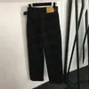 Klasyczne dżinsowe dżinsy damskie dżinsy z paskiem literowym wysokim talią proste spodnie nogi Hiphop Street Style Desher