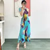 Vestidos de trabajo Miyake Pliegues Elegante Camiseta delgada con estampado floral Cintura alta Falda midi plisada de una línea Falda midi de dos piezas Traje de moda de nicho