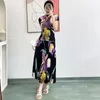 Vestidos de trabajo Miyake Pliegues Elegante Camiseta delgada con estampado floral Cintura alta Falda midi plisada de una línea Falda midi de dos piezas Traje de moda de nicho