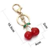 Czerwony Cherry Bierek Bluczowy Kryształowy Rhinestone Cute Fruit Worka Wiselan Akcesoria Key Cain Pierścień Rzut biżuterii K401 240103