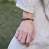 Strand Agarwood Künstlerische Armbänder für Männer und Frauen, zarte einzelne Kreis-Buddha-Perlen, kulturell verspielt für Paare