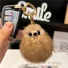 Plush Ball Real Fox Fur Keychain Söt Fashion Pendant Women Handväskor Ornament Bil Nyckel Trinor Metal Rings Highend Gift 240103