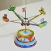 Rolig vuxensamling Retro Wind Up Toy Metal Tin Amusement Park Rotating Plan Windmil Mechanical Clockwork Toy Figures Gift 240103