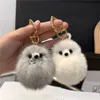 Plush Ball Real Fox Fur Keychain Söt Fashion Pendant Women Handväskor Ornament Bil Nyckel Trinor Metal Rings Highend Gift 240103