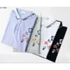 Printemps Été Hommes Polo Chemise Italie Shorts Manches Tee Designer Polos Tshirt Revers Hommes Jarretière Lettres Petite Abeille Impression Vêtements