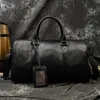Fashion äkta läder Duffel Bag Big Cow Leather Men Women Affärsrese Black Large Shoulder Bags Weekend Bagage Bags 240104