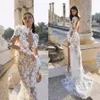 Bohemian Beach Sexy Lace Mermaid Wedding Dress 2024 High Collar Side Slit Flowers Appliques Long Sleeves Sweep Train Boho Bridal Gown