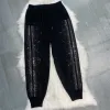 Pantalon de survêtement tricoté taille haute pour femmes, sarouel fin et extensible, clouté sur le côté, pull brillant, printemps été