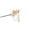 Hårklipp Golden Stick Floral Pealr Tassel Hairpin Chopstick Lady Hanfu huvudbad fjäril Kinesiska tillbehör retro smycken