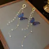 Boucles d'oreilles à tige en cristal de perle de corée du sud, pompon papillon, Design français, tempérament