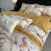 Conjuntos de ropa de cama Algodón engrosado y cepillado 4 piezas Ins Floral Funda de cama Sábana impresa con borde