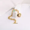 18k Gold T Brand Gold Charm Classic Blue Drip Oil Full Diamond Love Heart Ot Buckle Bracciale per donne