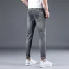 2023 Lente/zomer Dunne Europese en Amerikaanse Trendy Populaire Print Elastische Slim Fit Kleine Rechte Pijp Veelzijdige 9-inch Jeans voor Heren