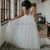 Chic Bohemian Spets Wedding Dress 2024 Sexig rygglös V Neck Country Style Brudklänning Golvlängd Tulle en linjetrens klänning Summer Boho Beach Civil Robe de Mariage