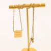 Luksusowy projektant wisiorek ze stali nierdzewnej Naszyjnik Choker 18K Gold Link Link Letter Wisianty Naszyjniki do mody Słynne dla kobiet akcesoria biżuterii
