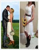 Kleine witte jurk Vintage hoog laag strand trouwjurken Full Lace V-hals Boheemse Western Country Cowgirls Bruidsreceptiejurk9203629