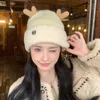 비니 두개골 모자 토끼 머리 니트 모트 가을과 겨울과 겨울에 여자를위한 양모 모자는 따뜻한 귀 보호 감기를 타는 Baotou 학생들