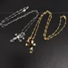 Unisex designer korsar hänghalsband vintage diamantrösta dubbel korshalsband europeiska och amerikanska par benben kedja
