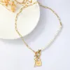 Collane con ciondolo Ins Collana con catena di perle di vetro con chiave a forma di cuore in acciaio inossidabile placcato oro 14K per le donne Festa ipoallergenica impermeabile