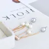 Boucles d'oreilles à clous pour femmes, bijoux européens et américains, Texture métallique, chaîne conique, pompon, perle, vente en gros, tendance