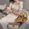 Robes décontractées une robe en une pièce coréenne à manches courtes coréennes élégantes midi élégantes Design Floral Vintage Femme Office Dames 2024 Été chic