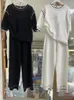 Pantaloni a due pezzi da donna 2024 Pantaloni da donna lavorati a maglia estivi Set maglione a maniche corte allentato Top a vita alta Gamba larga