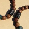 Link Bracelets GoldenSilk Nanmu Bodhi Wooden Carved Black Sandalwood Bracelet With Men's And Women's Retro Ancient Prose Playing Beads