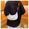 2024 NICHE High-End Dumpling New Internet Celebrity Högkvalitativ kvinnors handväska Lättkedja som bär crossbody-väska