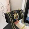 grossistkvinnor axelväskor 4 söt färg diamantkedja väska flip förtjockad läder handväska gata mode orm handväskor personlig spänne ryggsäck 84556#