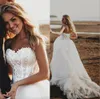 2024 Country Bohemian Wedding Dresses Sexig Sweetheart Lace Applicques Boho Bridal Glänningar Sexig backless Sweep Train A Line Wedding Dress