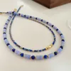 Pendanthalsband charm retro lapis lazuli färgad pärlhalsband för kvinnor mångsidiga benkedja smycken