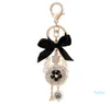 Lovely cute bow pearl flower perfume bottle keychains new fashion ins luxury designer diamond rhinestone bag charm5446618