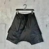 Tute da uomo Personalità scura Cuciture Pantaloncini Harem Moda Capris alla moda Pantaloni centrali Larghi uomini larghi