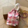 Designer Bag Prasa Spring Product Checker Print Handheld Nylon Waterproof DrawString Bucket Women's Bag Invertered Triangle Shoulder Crossbody
