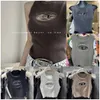 2024 Tasarımcı Deisels Boş Out Metal Etiket Örtüsü Kadınlar için Yeni Zayıflama ve Zayıflama Sıcak Kızların Kıyafetleri Disel F5