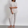 Mulheres sleepwear sólido casa 2pcs pijamas mulheres cor com nervuras malha manga curta tripulação pescoço tops com calças de cintura elástica loungewear