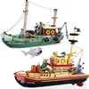 Blocs Ville bateau de pêche navire chalutier modèle blocs de construction ensemble bateau pirate pêcheur de mer figurines de requin blanc MOC jouets avec bâton meilleure qualité