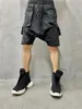 Tute da uomo Personalità scura Cuciture Pantaloncini Harem Moda Capris alla moda Pantaloni centrali Larghi uomini larghi