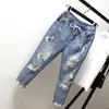 Springsummer Korea Fashion Women Ripped Jeans Elastic Midje Vintage Loose Blue Casual Denim Harem Pants S510 240104
