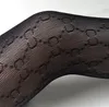 Haute qualité Sexy lettre C collants Design de mode poisson Net maille collants femmes bas 240105