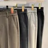 Pantaloni da uomo in lana autunno e inverno pantaloni da ufficio formali da ufficio slim fit dritti in vita elastica pantaloni marroni casual affusolati coreani 240105