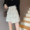 スカート秋冬2024年クラシックウールスタイルの格子縞のセクシーなミニショーツ女性2xlエレガントな不規則なハイウエストスカート