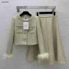 Ensemble deux pièces de luxe pour femmes, vêtements de créateur pour col rond, manteau court, taille haute et jupe longue, janvier 05